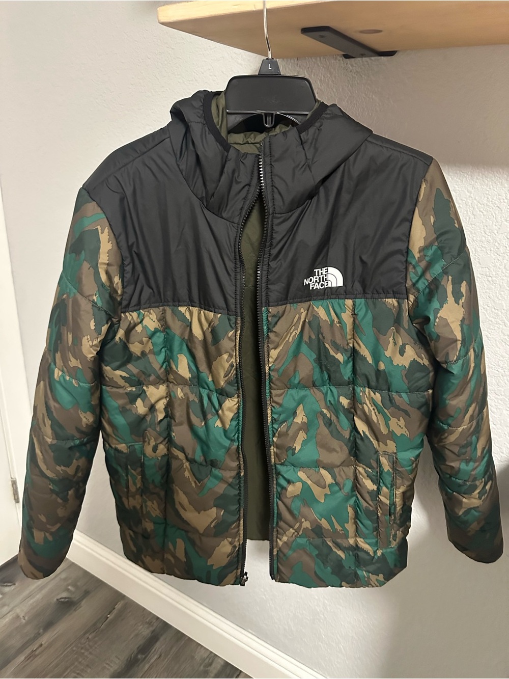 The North Face Camouflage Hooded Puffer Jacket in Green and Black reversible